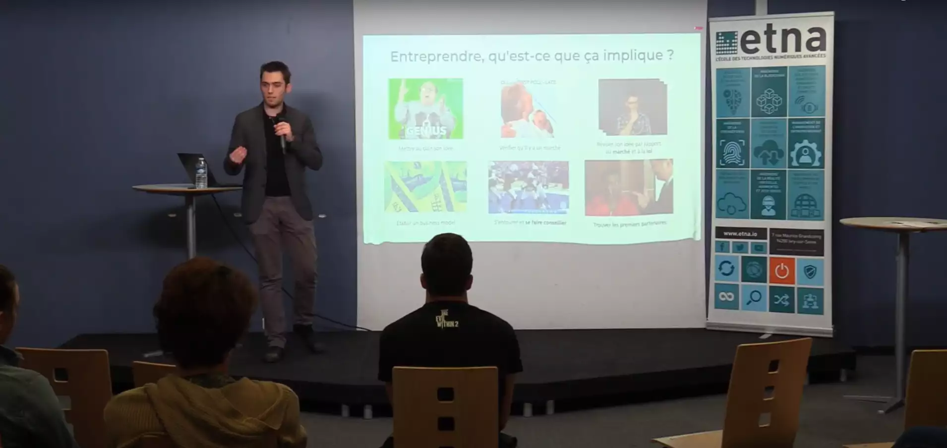 Someone speaking in a conference
